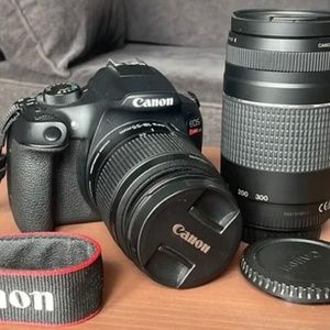 Canon rebel t6 camera with charger, battery and 2 lenses